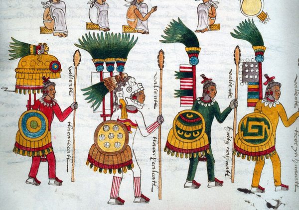 Four warriors in feathered costumes carrying round shields and clubs, drawn in a 16th-century manuscript